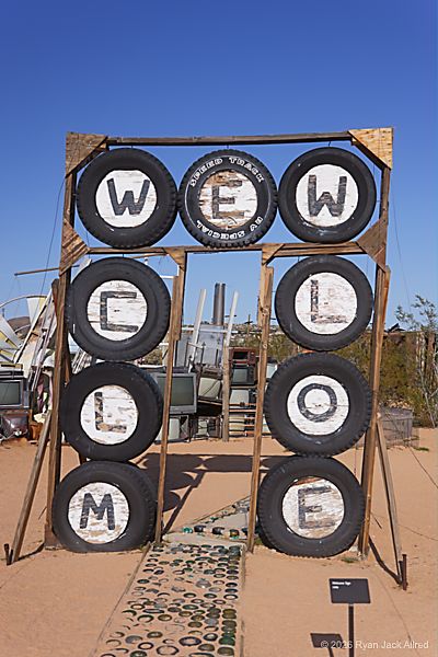 Noah Purifoy Welcome Sign
